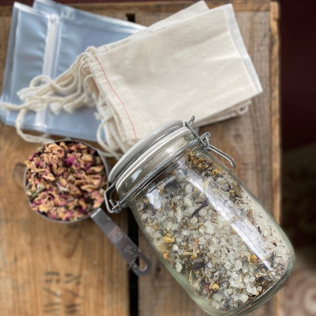 goddess herbal tea bath with sea salt, epson salts, wild lavender, chamomile and magnolia flowers. essential oils of champas, neroli, patchouli, lavender